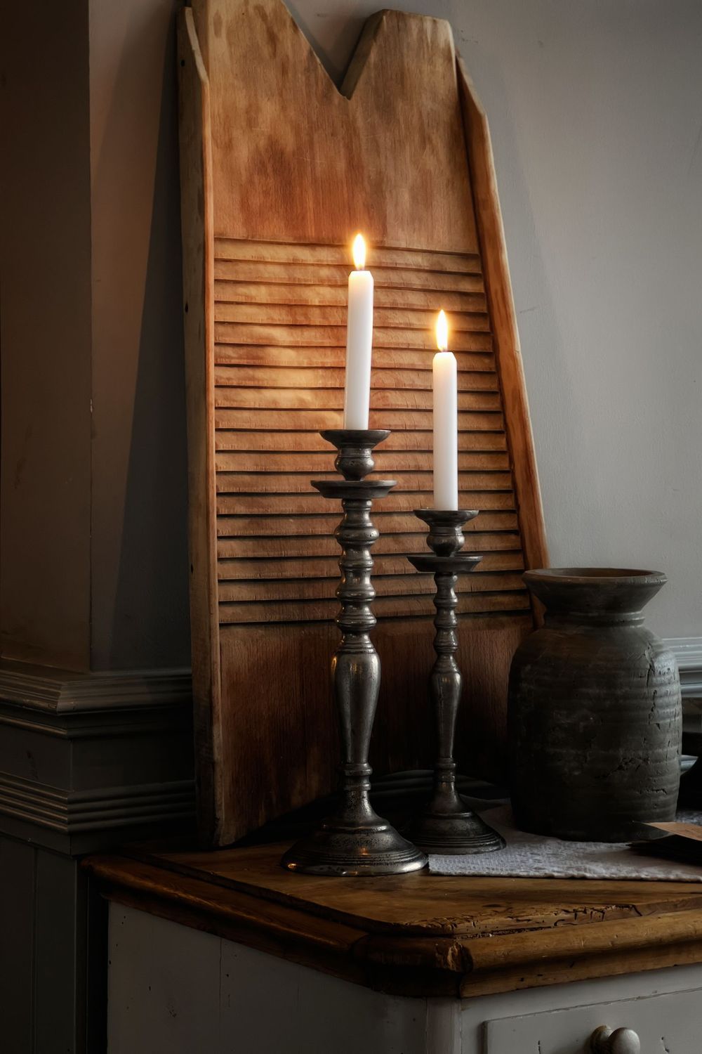 Turned candlesticks with taper candles